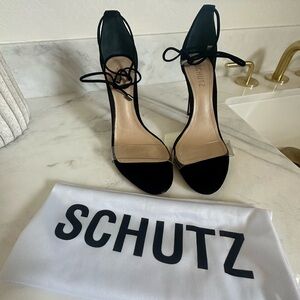 Schutz black and clear sandals